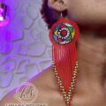 red nandi earrings with tessl