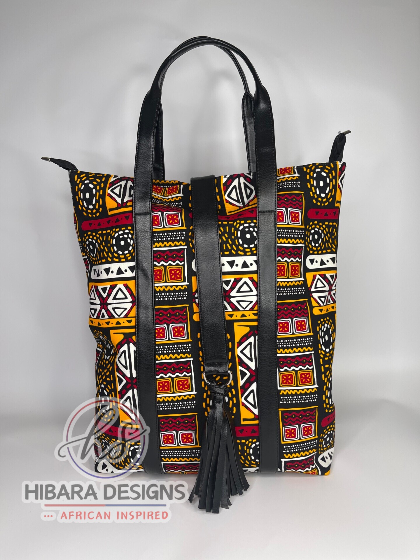 African print Tote bag This beautifully detailed African Ankara print was handmade into various sizes of handbags, and a spacious Toto bag perfect for health care workers product description •Fits nursing tools and can also fit a laptop perfectly • Double grab handle •leather well placed •Tassel detail •Inside zip pocket •thick and fancy unique lining