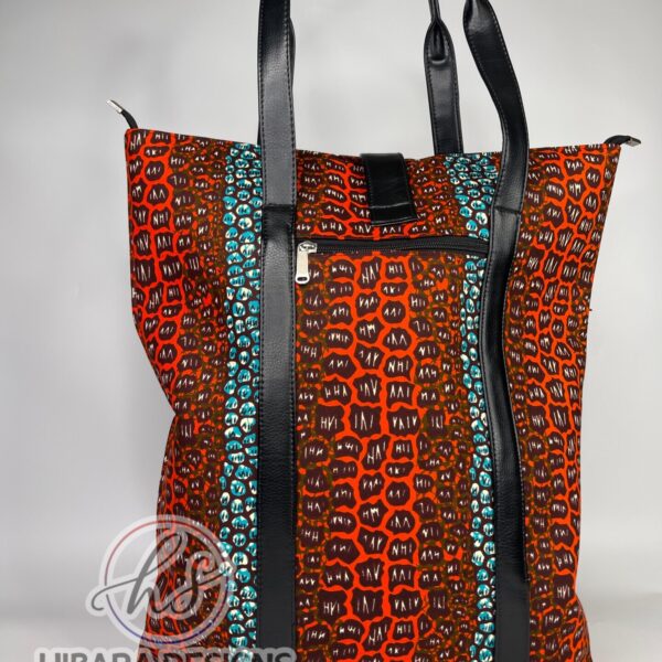 African print Tote bag This beautifully detailed African Ankara print was handmade into various sizes of handbags, and a spacious Toto bag perfect for health care workers product description •Fits nursing tools and can also fit a laptop perfectly • Double grab handle •leather well placed •Tassel detail •Inside zip pocket •thick and fancy unique lining