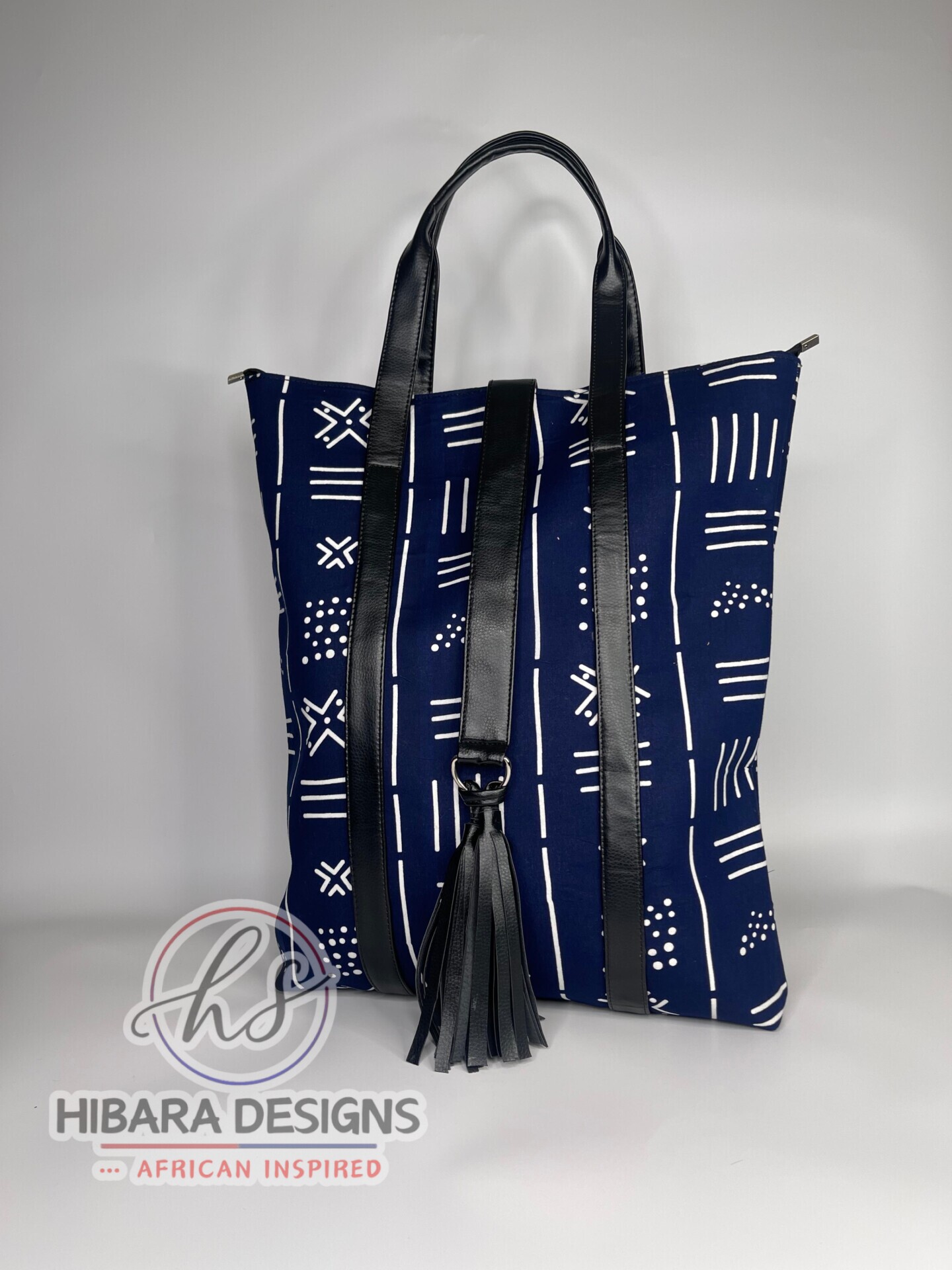 African print Tote bag This beautifully detailed African Ankara print was handmade into various sizes of handbags, and a spacious Toto bag perfect for health care workers product description •Fits nursing tools and can also fit a laptop perfectly • Double grab handle •leather well placed •Tassel detail •Inside zip pocket •thick and fancy unique lining