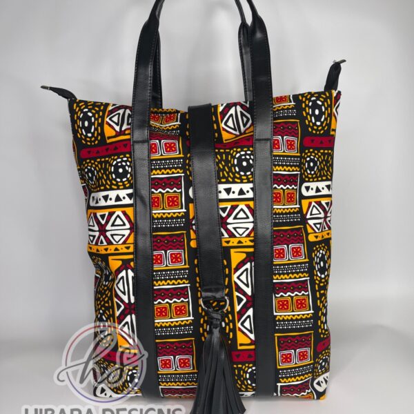 African print Tote bag This beautifully detailed African Ankara print was handmade into various sizes of handbags, and a spacious Toto bag perfect for health care workers product description •Fits nursing tools and can also fit a laptop perfectly • Double grab handle •leather well placed •Tassel detail •Inside zip pocket •thick and fancy unique lining