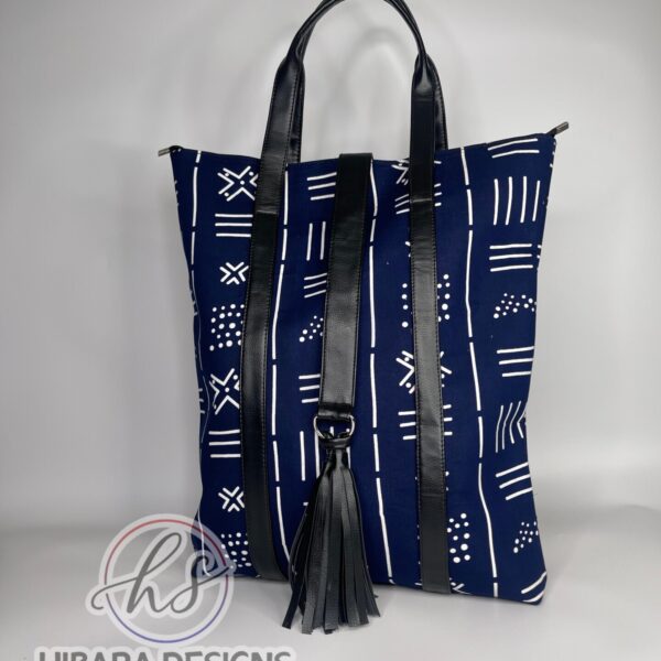 African print Tote bag This beautifully detailed African Ankara print was handmade into various sizes of handbags, and a spacious Toto bag perfect for health care workers product description •Fits nursing tools and can also fit a laptop perfectly • Double grab handle •leather well placed •Tassel detail •Inside zip pocket •thick and fancy unique lining