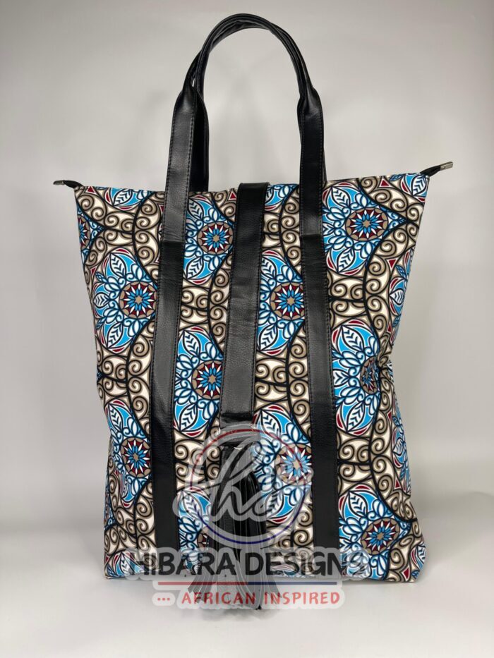 African print Tote bag This beautifully detailed African Ankara print was handmade into various sizes of handbags, and a spacious Toto bag perfect for health care workers product description •Fits nursing tools and can also fit a laptop perfectly • Double grab handle •leather well placed •Tassel detail •Inside zip pocket •thick and fancy unique lining