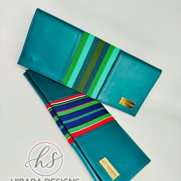 Our shangani bag is a leather clutch Bag Accented with Asooke