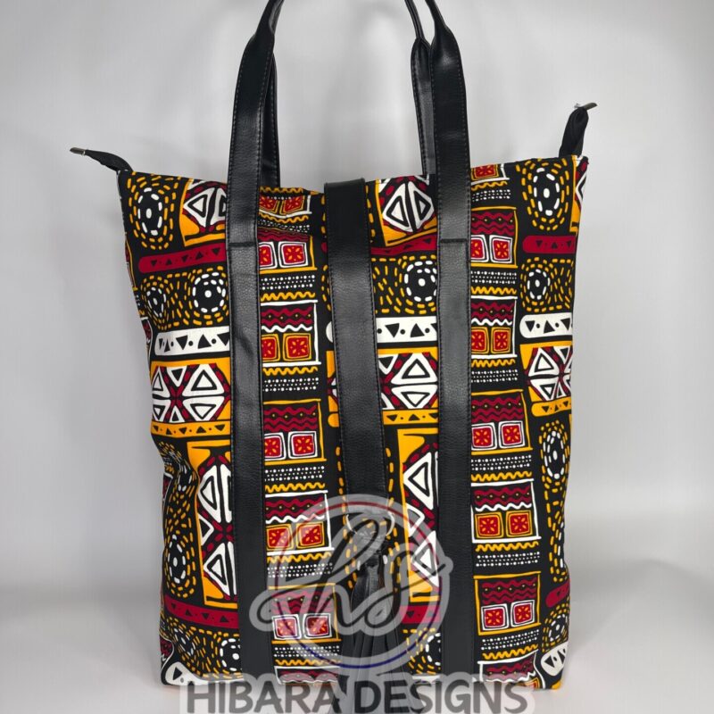 African print Tote bag This beautifully detailed African Ankara print was handmade into various sizes of handbags, and a spacious Toto bag perfect for health care workers product description •Fits nursing tools and can also fit a laptop perfectly • Double grab handle •leather well placed •Tassel detail •Inside zip pocket •thick and fancy unique lining