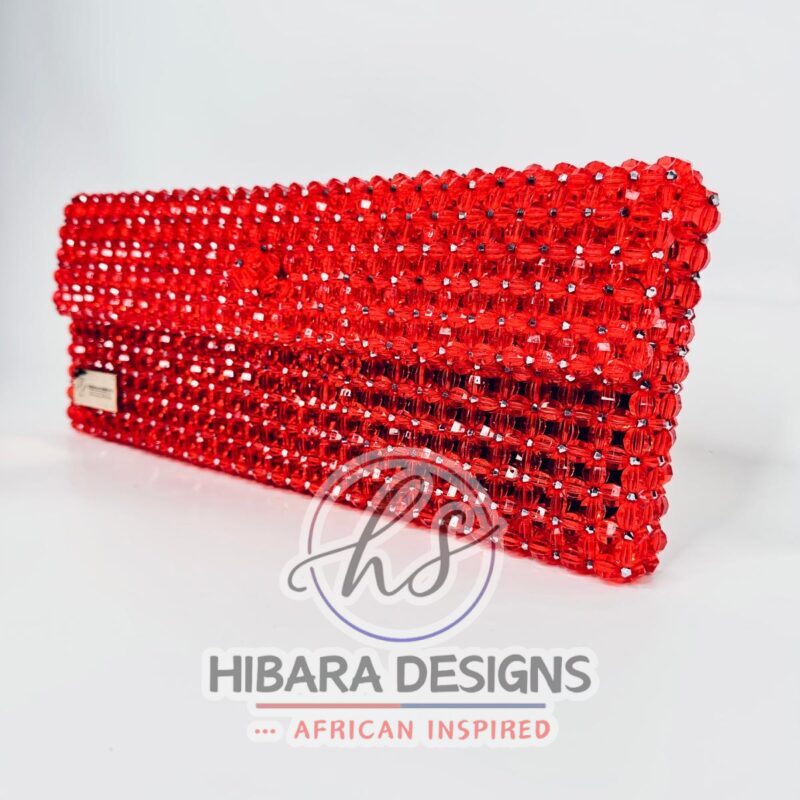 Introducing the Ooni Collection, your new favorite oversized clutch bag. She's bold, she's beautiful, she's BEADED, and most importantly, she sparkles when she enters the room, just like YOU! Handcrafted with love by female artisans from Lagos, Nigeria. Dimension:9x15 inches Material: Crystal Beads Interior: Satin-lined Your Efik bag is handcrafted specially, just for you! Due to the craftsmanship and time it takes to make each bag, please allow up to 2 to 4 weeks for your order to be shipped. Enjoy complimentary Priority 2 day shipping on U.S. orders! On your preorder items