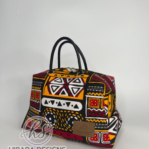 Fashion is Beauty. Beauty propels Fashion. Our signature bag can be use for multi things like as a Makeup bag, work bag, diaper and wipe holder bag etc Shop this Ankara handmade multi purpose bag. made with a beautifully patterned African prints. You can wash and re-use this bag whenever you feel its dirty. Another advantage is that this Ankara print makeup bag doesn't lock in stains from makeup products