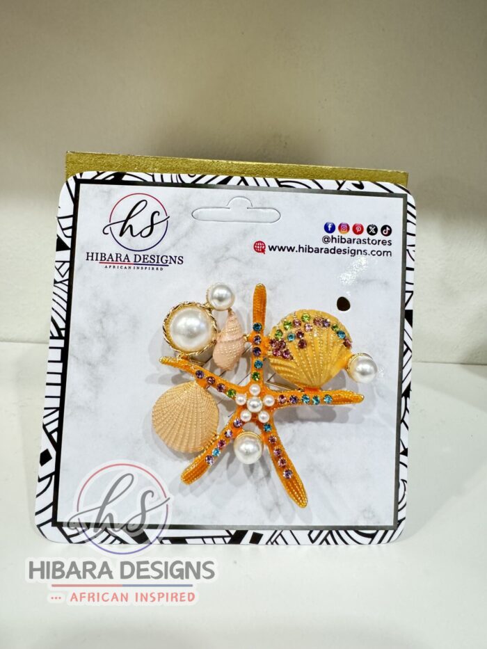 Orange shell starfish brooch