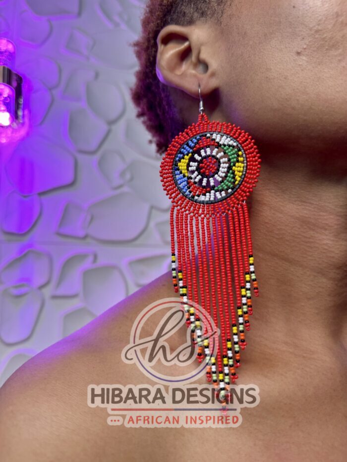 red nandi earrings with tessl