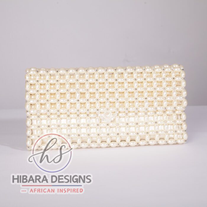 Pearls cylinder’s Ooni Oversized Beaded Clutch